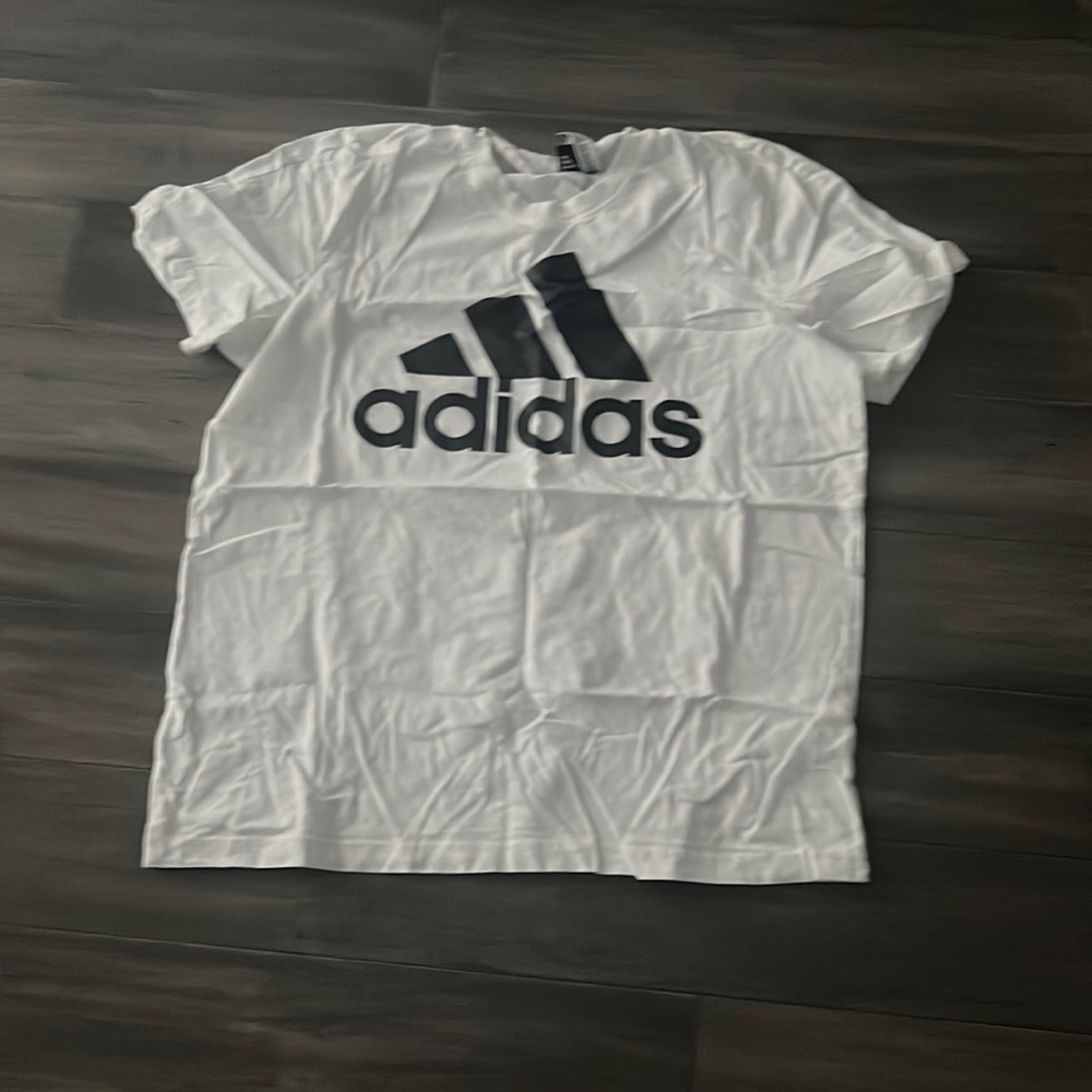 Adidas tee..never worn , never washed.. XL…$20..
